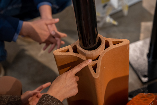 A module of the ceramic columns that will support Rice University's installation at Post Houston. Faculty members are installing