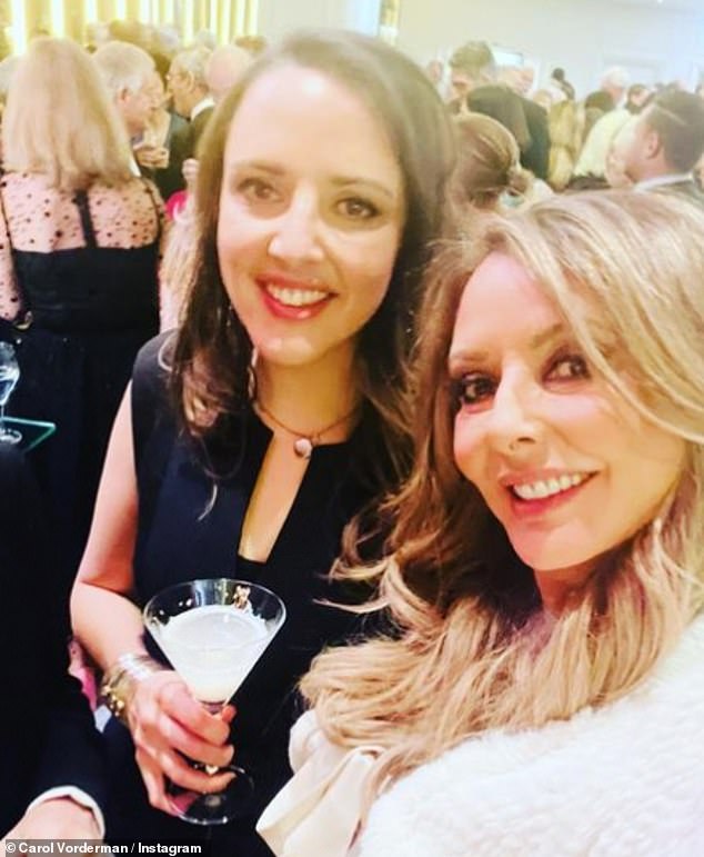 Carol Vorderman enjoys a night out with lookalike daughter Kate King at private members club