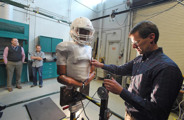 The National Football League says it's never seen anything like it --rubbery, fluid-filled straps that tether the helmet to the body