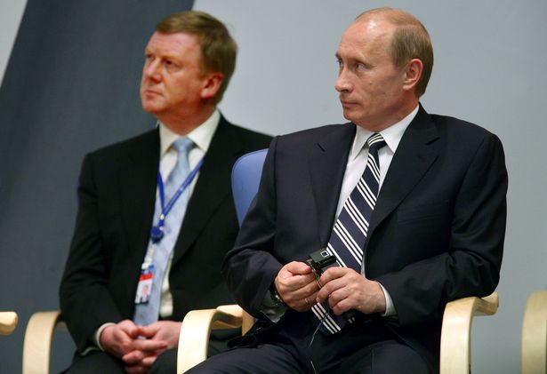 Anatoly Chubais, left, and Russian Federation President Vladimir Putin